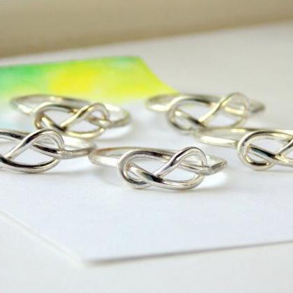 Batch Of Infinity Knot Rings: Sterling Silver..